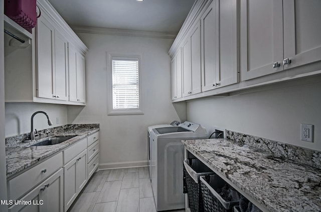 220 S Woodcreek Rd, Madison, MS 39110 - laundry area with cabinet space, washer and clothes dryer, and ornamental molding