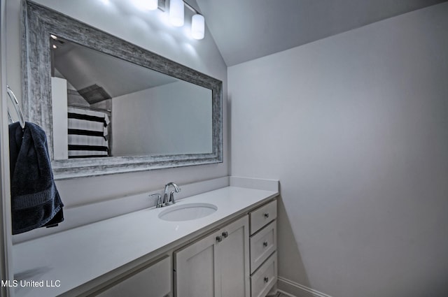 220 S Woodcreek Rd, Madison, MS 39110 - bathroom with lofted ceiling, vanity, and a shower with shower curtain