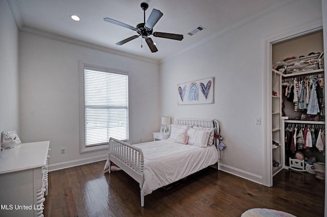 220 S Woodcreek Rd, Madison, MS 39110 - bedroom with a walk in closet, dark wood finished floors, a closet, ornamental molding, and recessed lighting