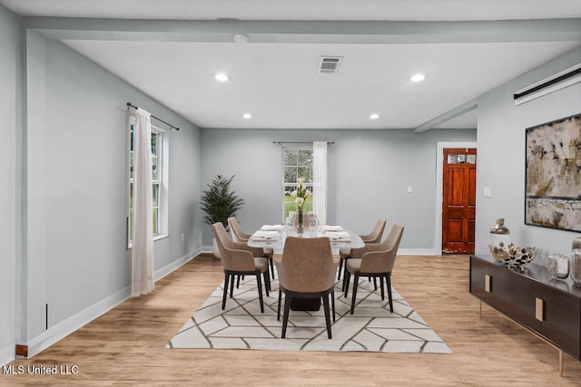 dining room featuring light wood-type flooring