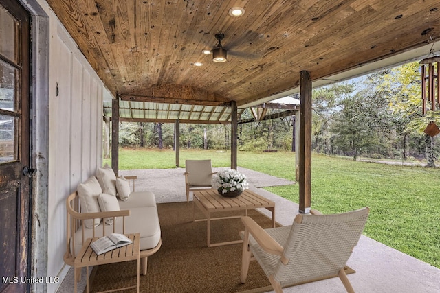 view of patio featuring outdoor lounge area and ceiling fan