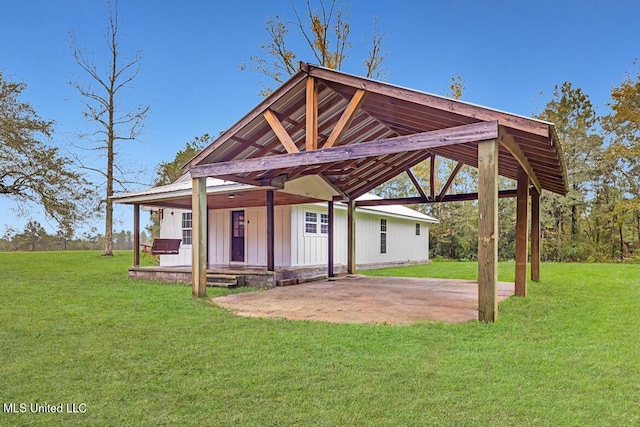 view of property's community featuring a patio area and a yard