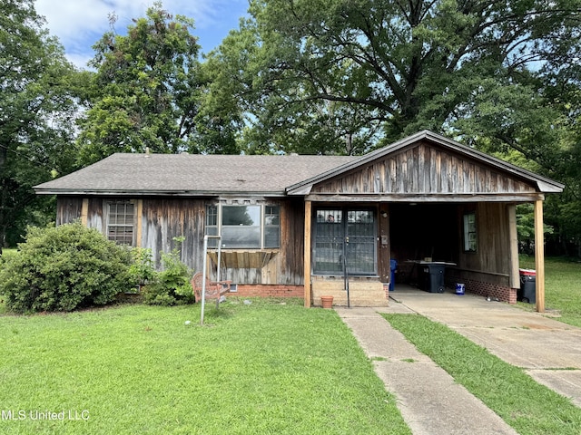 221 N Third Ave, Cleveland, MS 38732 - view of front of home with a front lawn and a shingled roof