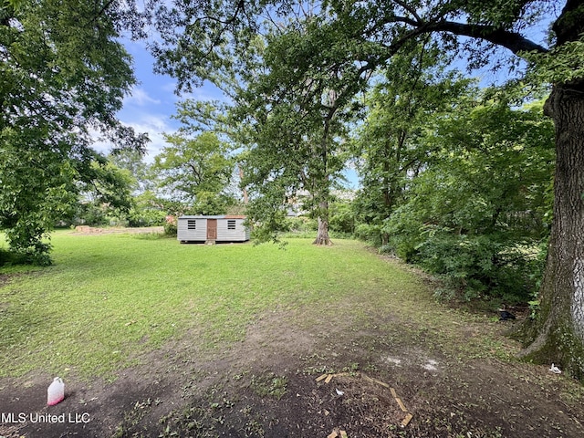 221 N Third Ave, Cleveland, MS 38732 - view of grassy yard featuring an outdoor structure