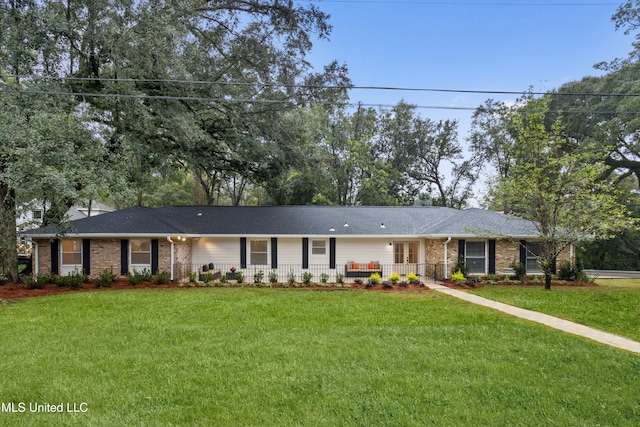 ranch-style house with covered porch, brick siding, and a front lawn