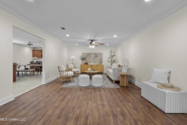13901 Plano Rd, Ocean Springs, MS 39564 - living area featuring recessed lighting, wood finished floors, ceiling fan, baseboards, and crown molding