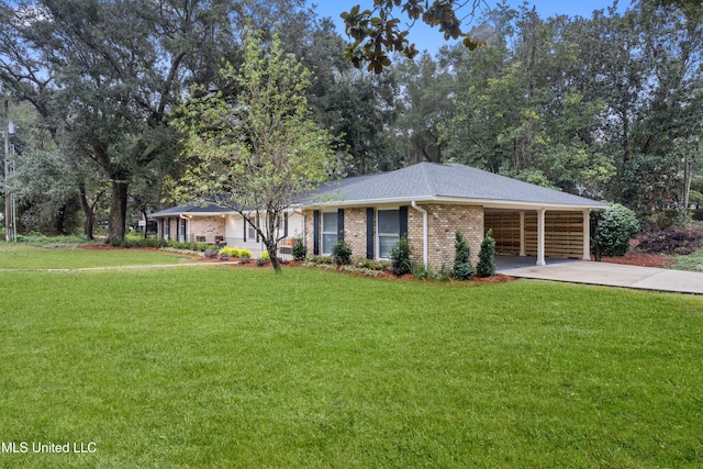 view of front facade featuring a front yard and a carport