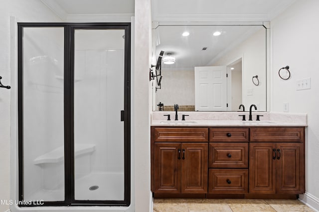 bathroom featuring vanity, ornamental molding, and walk in shower