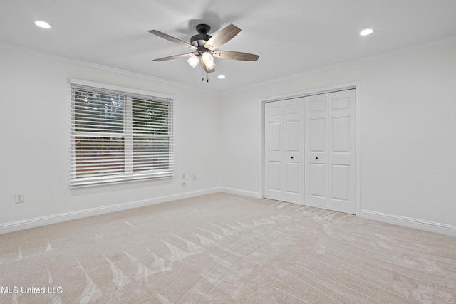13901 Plano Rd, Ocean Springs, MS 39564 - unfurnished bedroom with carpet flooring, recessed lighting, crown molding, baseboards, and a closet