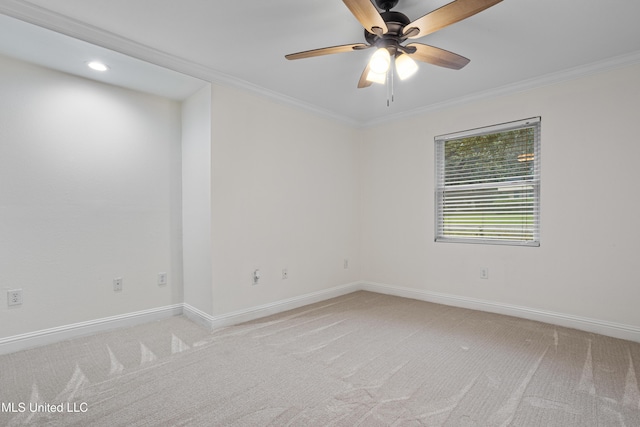 13901 Plano Rd, Ocean Springs, MS 39564 - empty room with light carpet, crown molding, a ceiling fan, and baseboards
