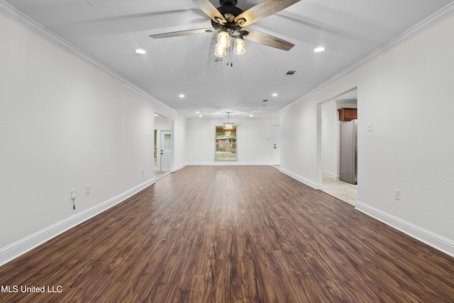 interior space featuring hardwood / wood-style flooring and crown molding