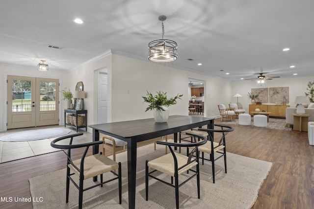 13901 Plano Rd, Ocean Springs, MS 39564 - dining room featuring recessed lighting, wood finished floors, french doors, ornamental molding, and ceiling fan