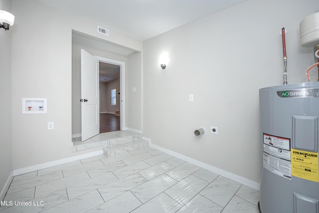 washroom with washer hookup, hookup for an electric dryer, and electric water heater