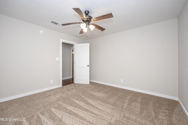 unfurnished room featuring carpet flooring and ceiling fan