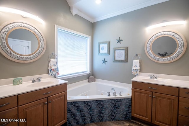 bathroom featuring vanity, ornamental molding, and a relaxing tiled tub