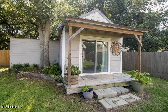 view of outdoor structure with a lawn