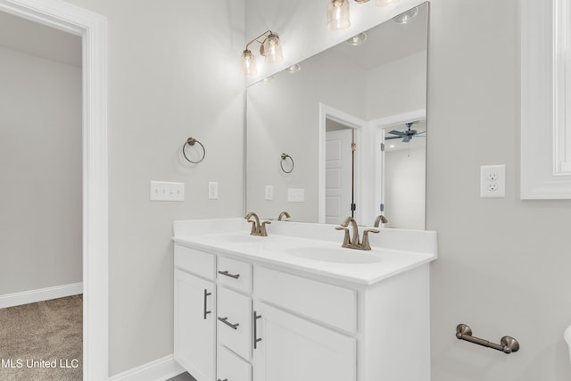 10262 March Meadows Way, Olive Branch, MS 38654 - bathroom with double vanity, a ceiling fan, and baseboards