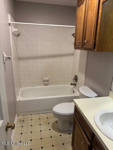 1613 Springridge Dr, Jackson, MS 39211 - bathroom with vanity, toilet, and tub / shower combination
