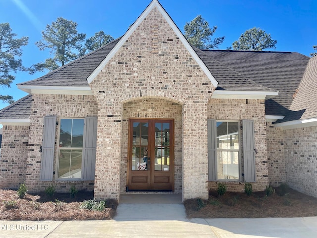 352 Wellstone Pl, Madison, MS 39110 - entrance to property with brick siding, french doors, and a shingled roof