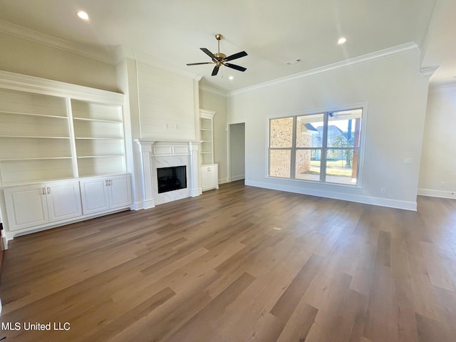 352 Wellstone Pl, Madison, MS 39110 - unfurnished living room featuring crown molding, ceiling fan, baseboards, wood finished floors, and recessed lighting