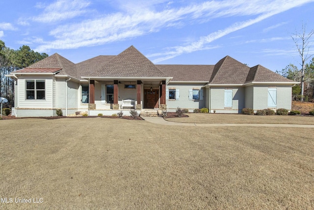 single story home featuring a front yard and a porch