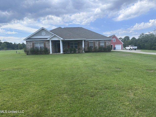 8101 Pecan Ridge Dr, Moss Point, MS 39562 - view of front of property featuring driveway, a front yard, and a garage