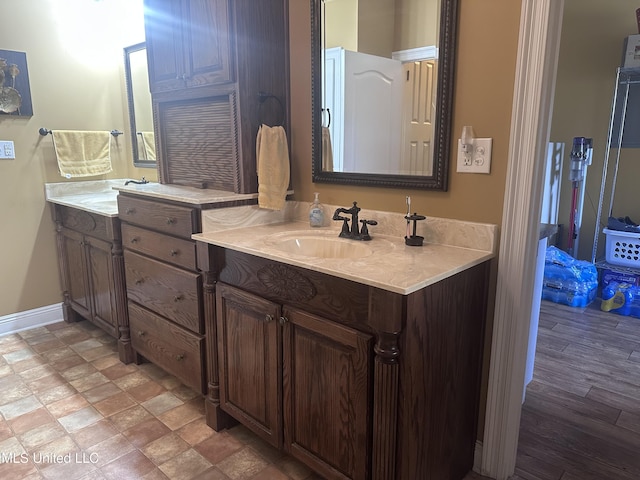8101 Pecan Ridge Dr, Moss Point, MS 39562 - bathroom with double vanity and baseboards