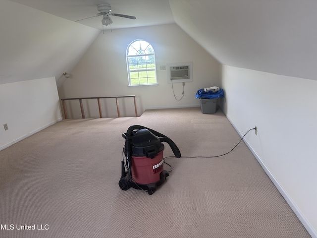 8101 Pecan Ridge Dr, Moss Point, MS 39562 - additional living space with an AC wall unit, carpet floors, vaulted ceiling, and a ceiling fan