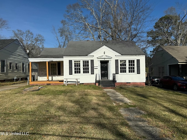 view of front of property with covered porch and a front yard