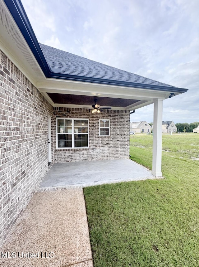 view of patio with ceiling fan