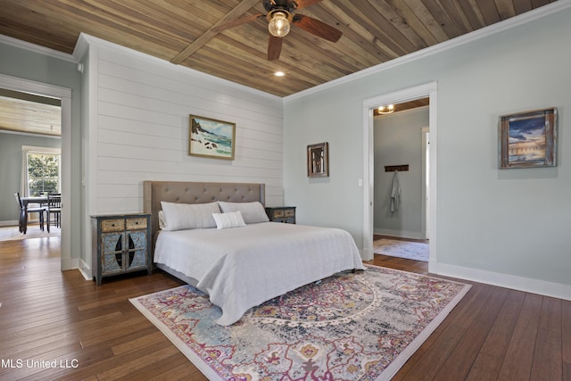 bedroom featuring dark wood-style floors, baseboards, wooden ceiling, and ornamental molding