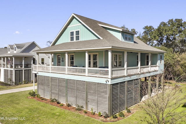 view of front facade with a porch and a front lawn