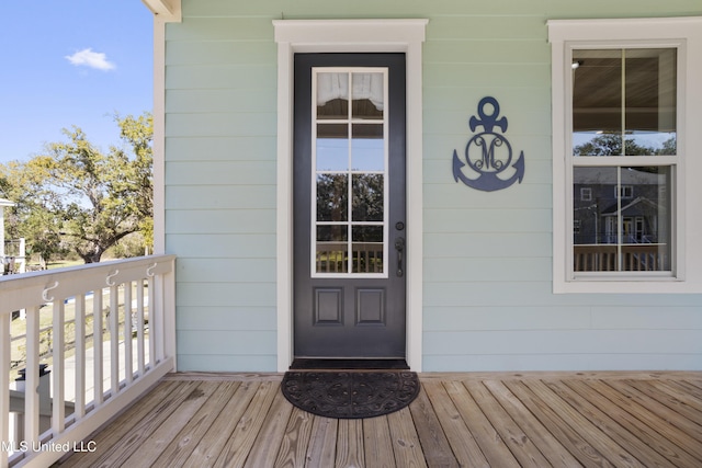 property entrance with a balcony