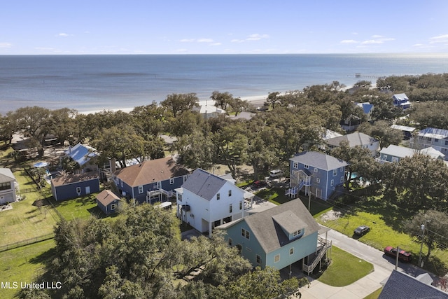 drone / aerial view featuring a water view and a residential view