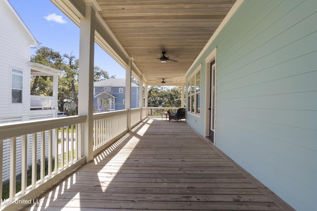 wooden terrace with ceiling fan