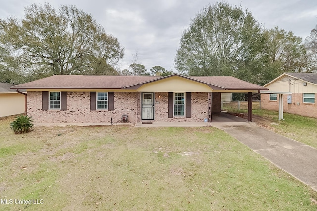 single story home featuring a carport and a front yard