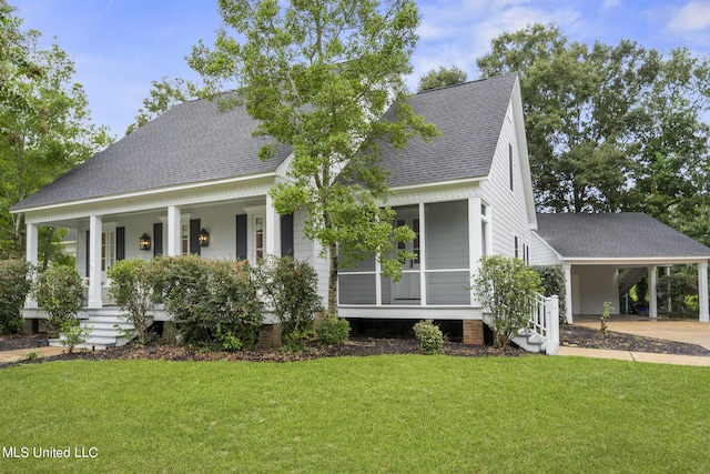 view of front of house featuring driveway, a carport, a front lawn, and a shingled roof