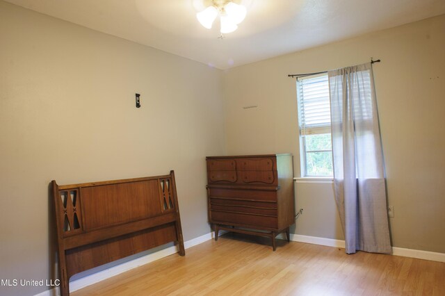 1639 Pascagoula River Rd, Moss Point, MS 39562 - bedroom featuring light wood finished floors, baseboards, and ceiling fan