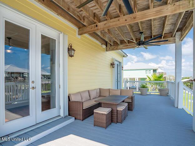 view of patio / terrace featuring an outdoor living space and a ceiling fan