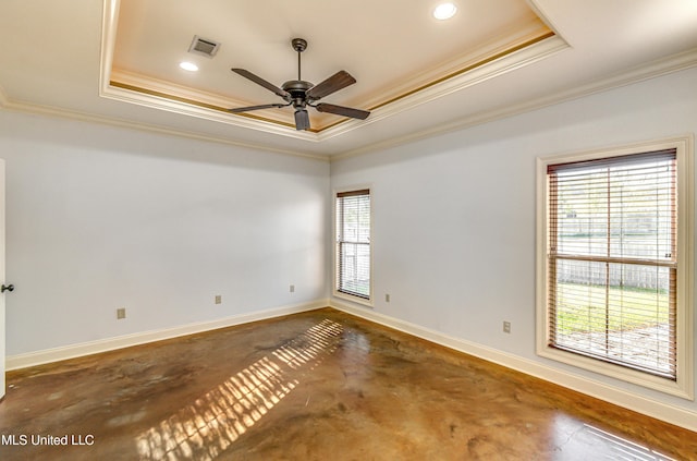 128 Amethyst Ln, Brandon, MS 39047 - empty room featuring a tray ceiling, concrete floors, crown molding, a ceiling fan, and baseboards