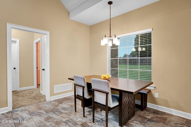 4813 Rosepetal Cv, Southaven, MS 38672 - dining room with baseboards, stone finish floor, a chandelier, and visible vents