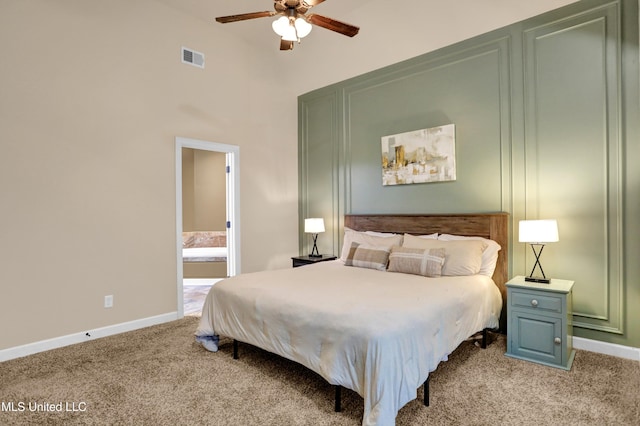 4813 Rosepetal Cv, Southaven, MS 38672 - bedroom featuring visible vents, a towering ceiling, light colored carpet, baseboards, and connected bathroom