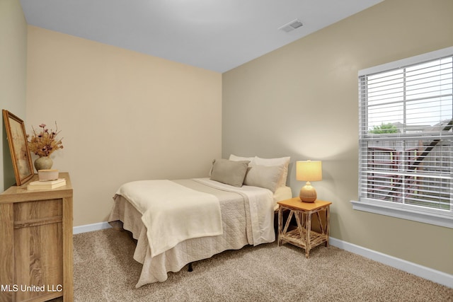 4813 Rosepetal Cv, Southaven, MS 38672 - carpeted bedroom featuring baseboards, visible vents, and multiple windows