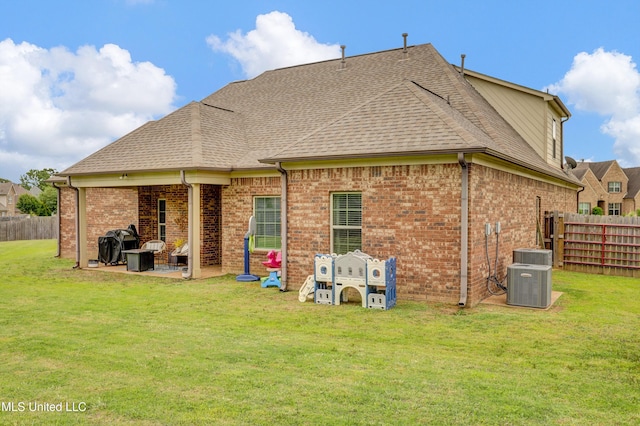 4813 Rosepetal Cv, Southaven, MS 38672 - rear view of house featuring a yard, a patio, and fence