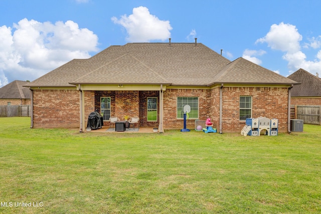 4813 Rosepetal Cv, Southaven, MS 38672 - rear view of house with a patio, a shingled roof, fence, and a yard