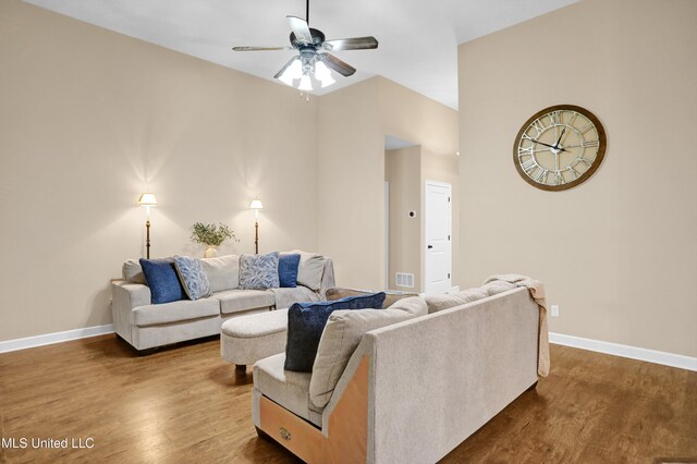 4813 Rosepetal Cv, Southaven, MS 38672 - living room with dark wood-type flooring, baseboards, ceiling fan, and visible vents
