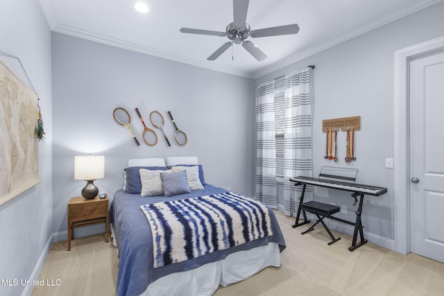 carpeted bedroom featuring baseboards, a ceiling fan, and crown molding