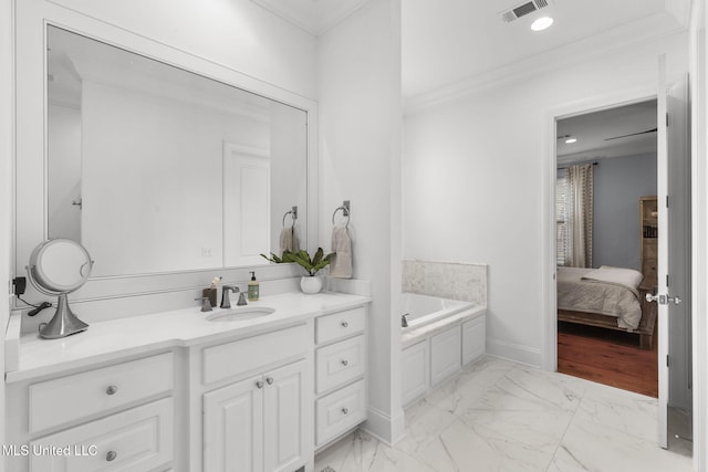 ensuite bathroom with visible vents, crown molding, marble finish floor, a garden tub, and connected bathroom