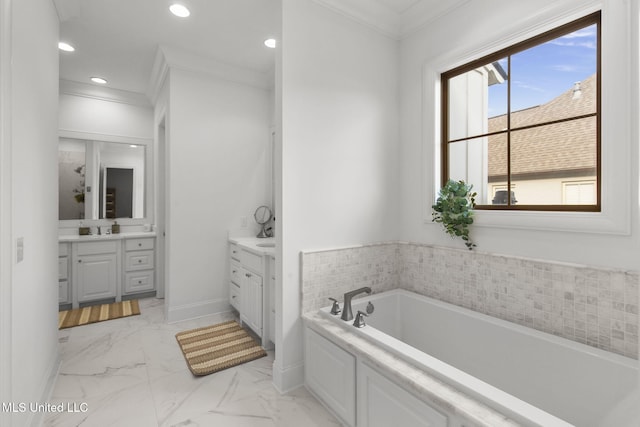 bathroom with crown molding, two vanities, a bath, and marble finish floor