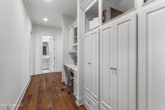 office featuring ornamental molding, dark wood-style flooring, built in study area, baseboards, and recessed lighting